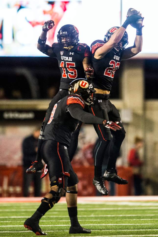 Chris Detrick  |  The Salt Lake Tribune
Utah Utes defensive back Dominique Hatfield (15) and Utah Utes defensive back Chase Hansen (22) celebrate after recovering a fumble during the first half of the game at Rice-Eccles Stadium Friday September 23, 2016.