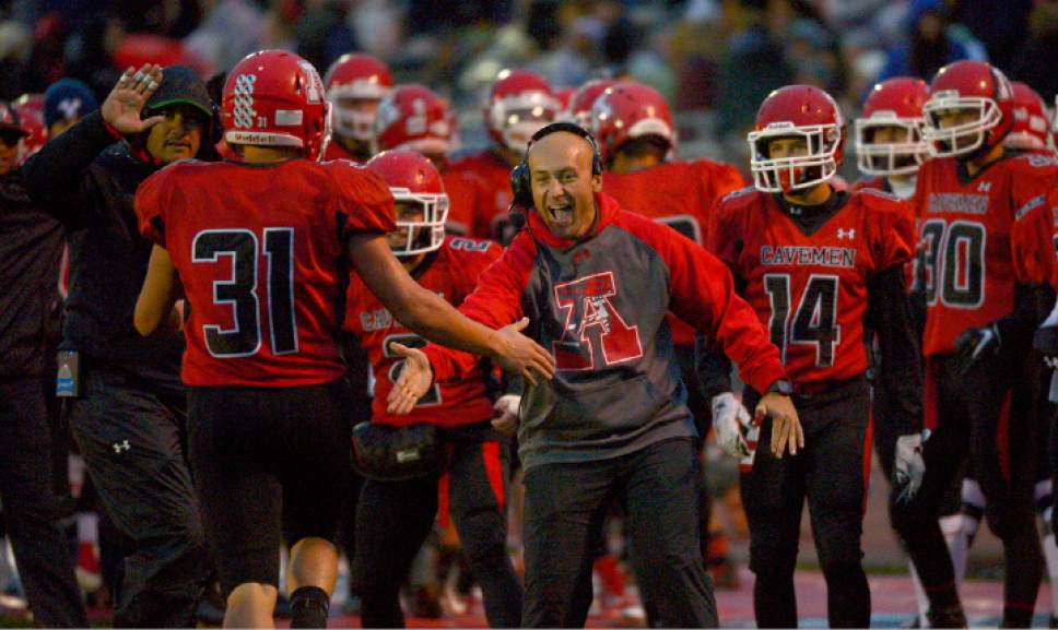 Leah Hogsten  |  The Salt Lake Tribune
American Fork's Farrell Dean celebrates his touchdown with the team. Sixth ranked American Fork High School football team leads 18th ranked Lehi High School 28-7 during their region four game in American Fork.
