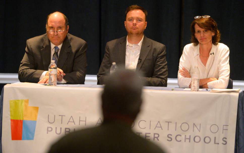Leah Hogsten  |  The Salt Lake Tribune
Ethan Millard (center) moderates the debate between the Utah State Board of Education's District 4 candidates, Dave Thomas, the incumbent school board vice-chairman, and Jennifer Graviet, an English teacher at Sandridge Junior High School in front of a dozen people in attendance at Syracuse Arts Academy, September 27, 2016.  The event was organized by the Utah Association of Public Charter Schools.