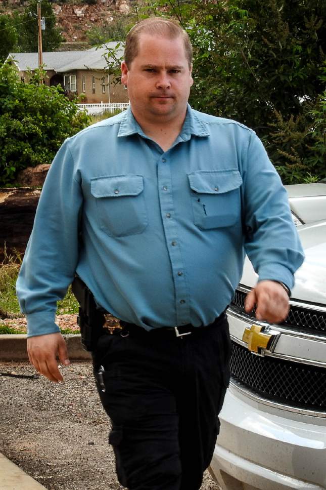 Trent Nelson  |  The Salt Lake Tribune

Curtis Cooke of the Colorado City/Hildale Marshals Office, in Hildale, Wednesday September 16, 2015.