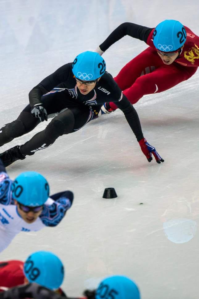 J.R. Celski, of Salt Lake City, and Dequan Chen, of China, (208) compete in the 1,500-meter short-track speedskating finals at Iceberg Skating Palace during the 2014 Sochi Olympic Games Monday February 10, 2014. Celski finished in fourth place with a time of 2:15.624, 0.639 behind gold medalist Charles Hamelin of Canada. (Photo by Chris Detrick/The Salt Lake Tribune)