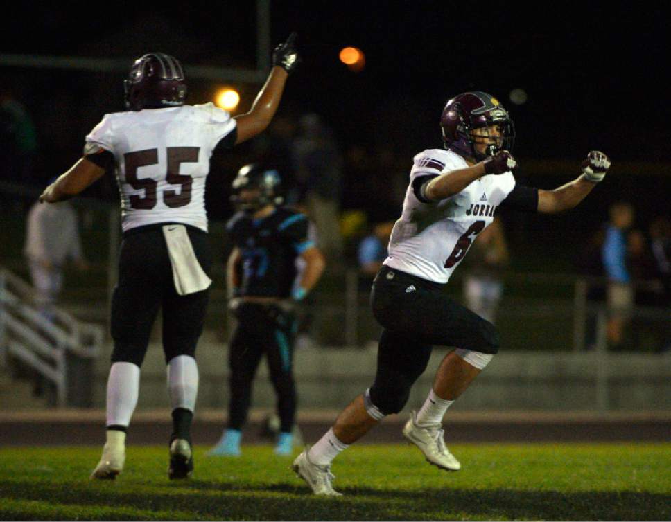 Leah Hogsten  |  The Salt Lake Tribune
Jordan's Preston Hagen celebrates stopping the West Jordan offense. Jordan High School defeated West Jordan High School football team 41-35 in their Region 3 football game, September 30, 2016.