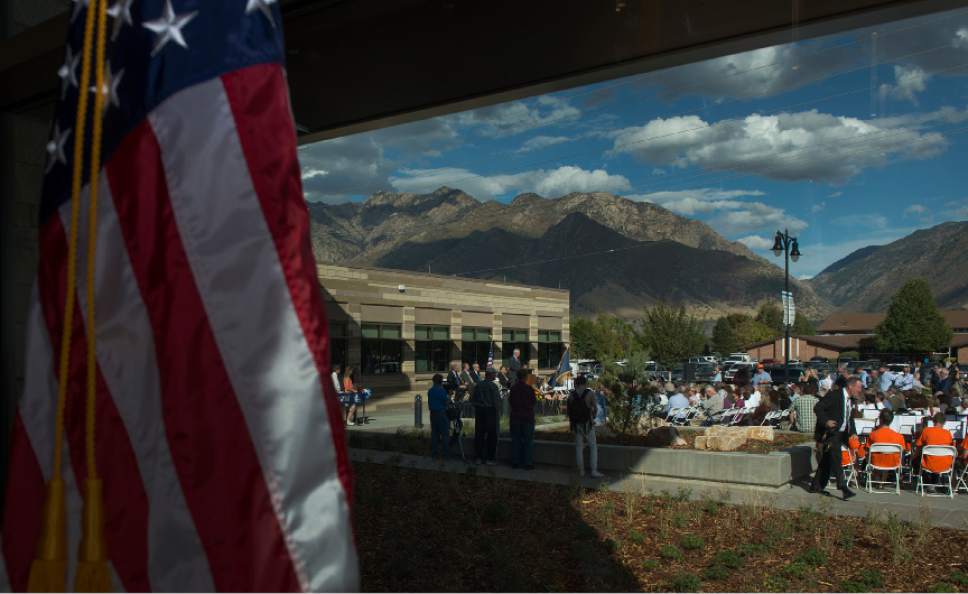 Leah Hogsten  |  The Salt Lake Tribune
 Cottonwood Heights City Hall officials, dignitaries and residents celebrated its official opening with an open house and ribbon cutting September 29, 2016.