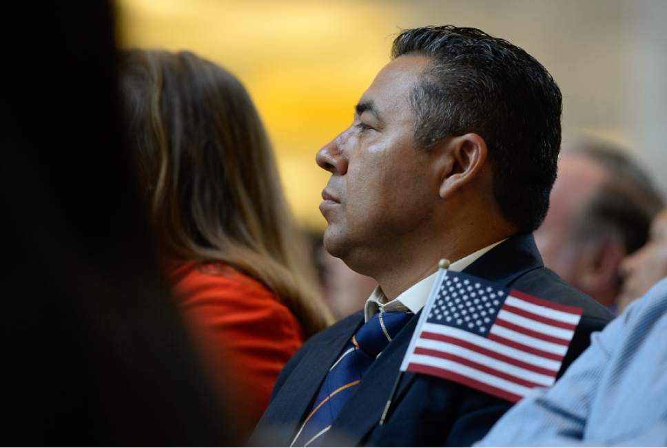 Francisco Kjolseth | The Salt Lake Tribune
Narciso Penate of Guatemala joins the 132 citizen applicants during a special naturalization ceremony at the Utah Capitol on Friday, Sept. 30, 2016. Representing 49 countries, friends and family joined the new U.S. citizens, filling the rotunda where they took the oath of allegiance.