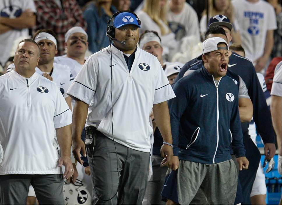 Scott Sommerdorf   |  The Salt Lake Tribune  
BYU head coach Kalani Sitake and the BYU bench wait for Toldeo to attempt a field goal late in the first half. The kicked was blocked. BYU and Toledo were tied 21-21 at the half, Friday, September 30, 2016.