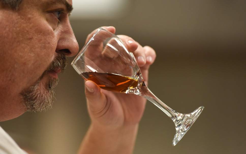 Francisco Kjolseth | The Salt Lake Tribune
George Gamvroulas, an employee of the Cottonwood Heights liquor store, smells the aroma of a sherry during a recent wine training class sponsored by the DABC. The Utah Department of Alcoholic Beverage Control got funding from the 2016 legislature for the training, something the public has been demanding for many years.
