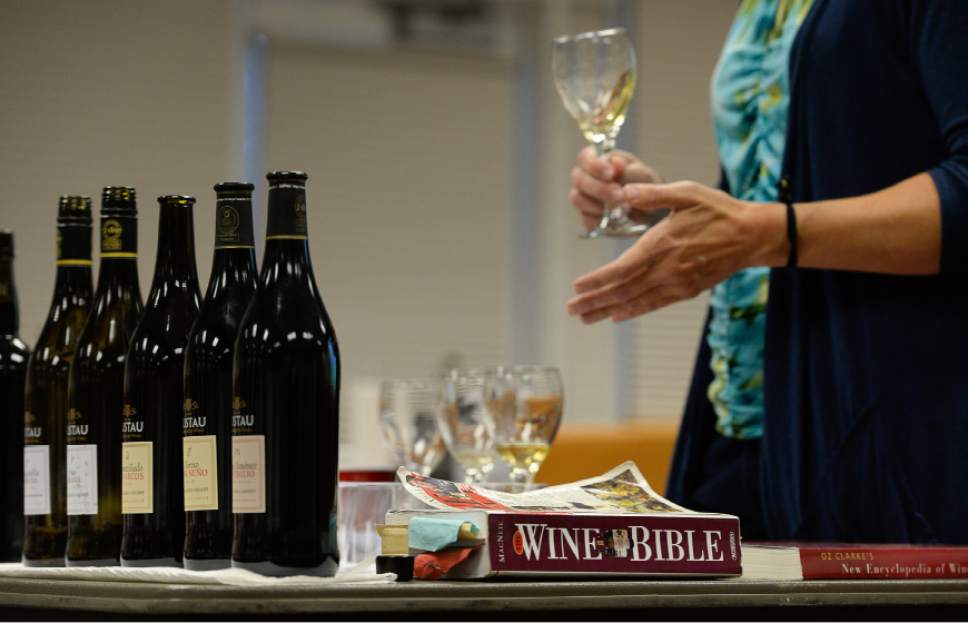 Francisco Kjolseth | The Salt Lake Tribune
Wendy Caron, a certified wine educator who was hired to teach an eight-week wine training class, discusses several wines during a recent meeting. The DABC just started the class for Utah's liquor store employees. The Utah Department of Alcoholic Beverage Control got funding from the 2016 legislature for the training, something the public has been demanding for many years.