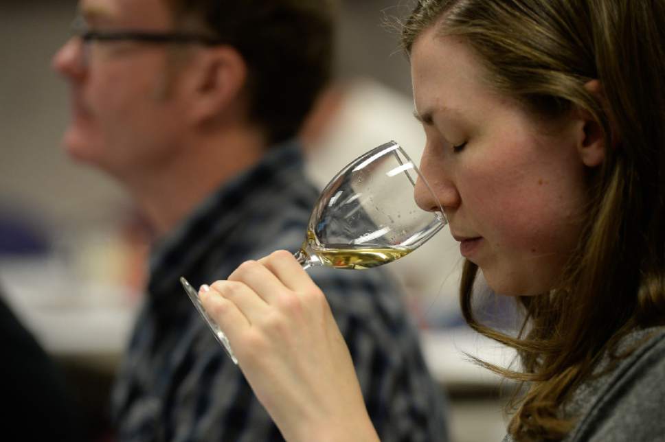 Francisco Kjolseth | The Salt Lake Tribune
Jessica Mitchell, an employee of the Wine Store in Salt Lake, focuses her nose on the aroma of a wine during a wine training class that the DABC just started for Utah's liquor store employees. The Utah Department of Alcoholic Beverage Control got funding from the 2016 legislature for the training, something the public has been demanding for many years.