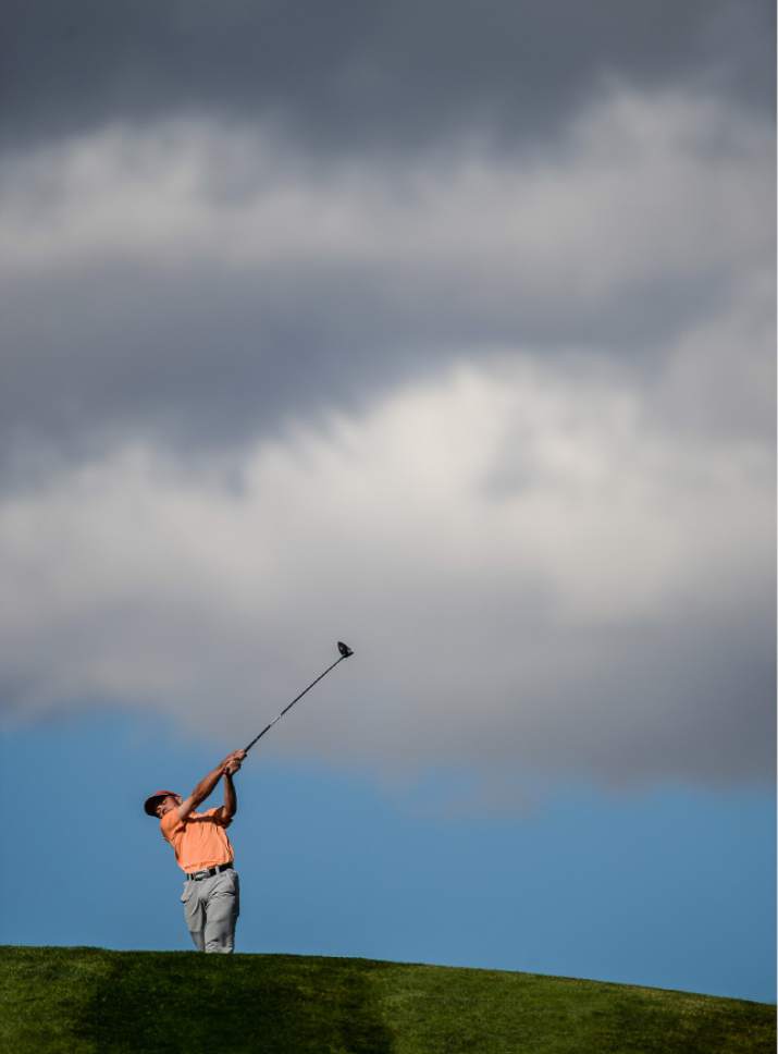 Francisco Kjolseth | The Salt Lake Tribune
Spencer Lillywhite of Timpview is framed by passing clouds while competing in the class 4A boys' golf championships at Soldier Hollow in Midway.