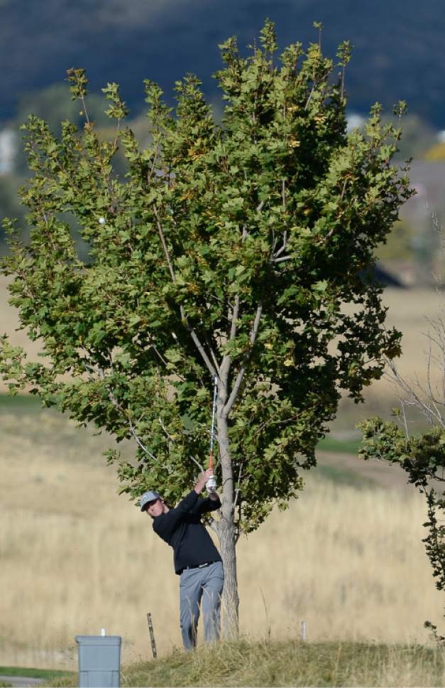 Francisco Kjolseth | The Salt Lake Tribune
Jake Marx of Box Elder works the final hole during the 4A boys' golf championships at Soldier Hollow in Midway.