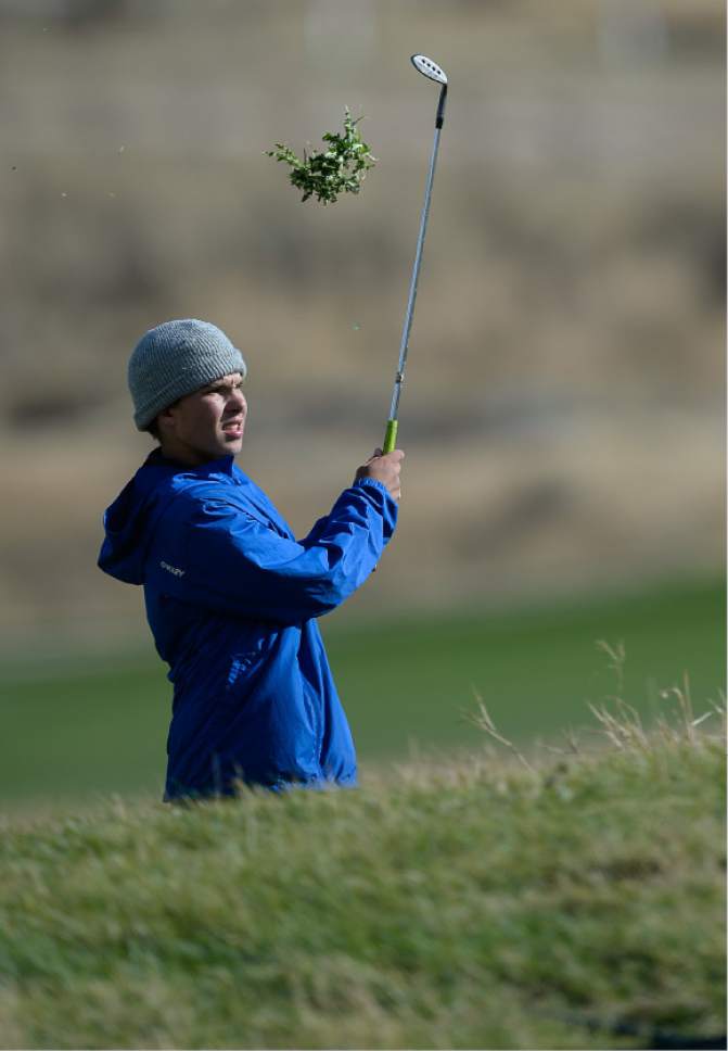 Francisco Kjolseth | The Salt Lake Tribune
Carson Dopp of Bonneville does a little gardening before taking his shot in the 4A boys' golf championships at Soldier Hollow in Midway.