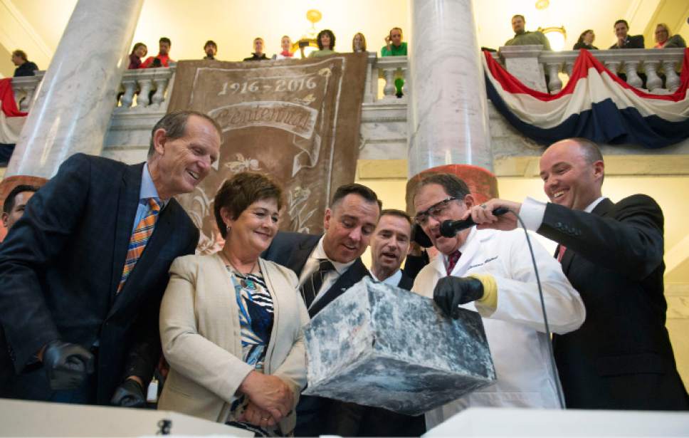 Steve Griffin / The Salt Lake Tribune


Gov. Gary Herbert  holds a copper time capsule up so local politicians can verify that it is empty after he removed items from the box that was placed in the State Capitol in April 1914, during a ceremony at the Capitol Rotunda in Salt Lake City Monday October 3, 2016.