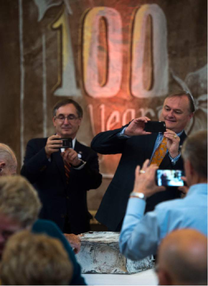 Steve Griffin / The Salt Lake Tribune


People photograph a copper time capsule that was placed in the State Capitol in April 1914. Gov. Gary Herbert removed the items during a ceremony at the Capitol Rotunda in Salt Lake City Monday October 3, 2016.