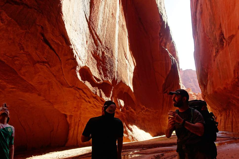 Lennie Mahler  |  The Salt Lake Tribune

Maurice Bürgin, Kristopherson Sloan and Peter Wagner explore a crack in the Paria Canyon called "The Hole" on Tuesday, Sept. 27, 2016.
