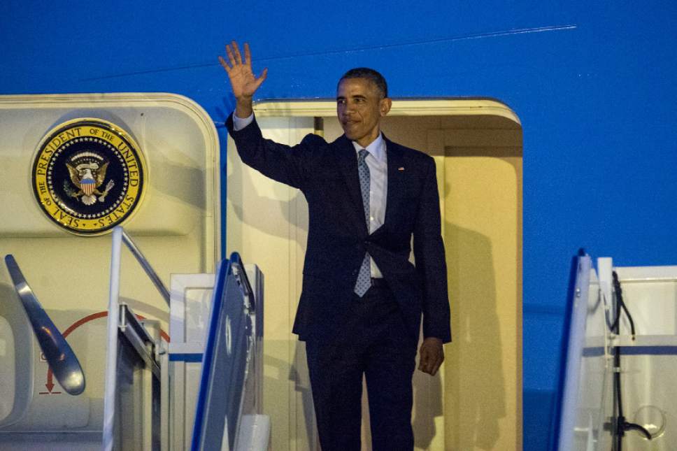Chris Detrick  |  The Salt Lake Tribune
President Barack Obama waves to the crowd as he arrives at Hill Air Force Base Thursday April 2, 2015.