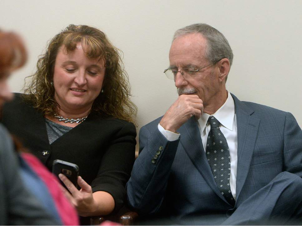 Al Hartmann  |  The Salt Lake Tribune
Salt Lake County County Recorder Gary Ott sits with his chief deputy, Julie Dole before the Salt Lake County Council is to present findings of the county auditor's performance review Tuesday, Oct. 4., 2016. A week later, the Salt Lake County Republican Party censured Dole, accusing her of hiding Ott's health status.