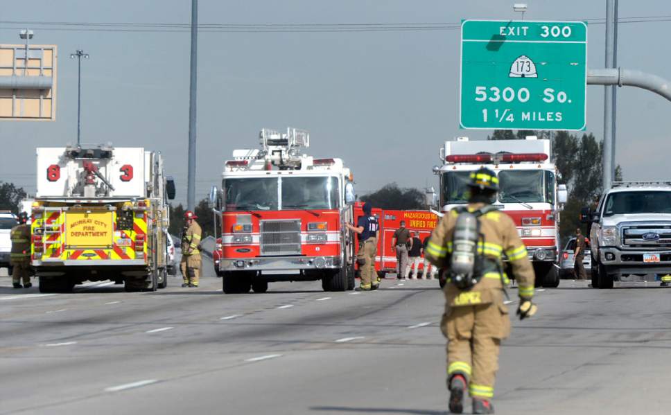 Al Hartmann  |  The Salt Lake Tribune
Emergency responders block off northbound I-15 at about 6600 South Wednesday, Oct. 5, 2016 after a truck carrying ammonium nitrate was involved in an accident.