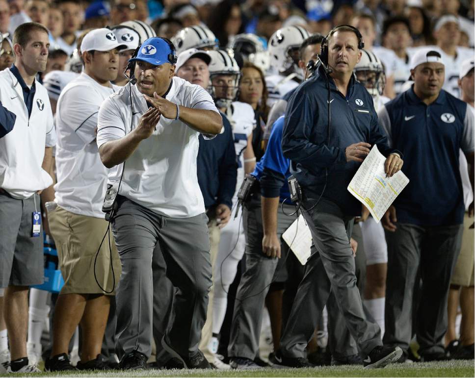 Scott Sommerdorf   |  The Salt Lake Tribune  
Brigham Young Cougars head coach Kalani Sitake calls time out with just two seconds to spare to set up for the winning field goal. BYU defeated Toledo 55-53, Friday, September 30, 2016.