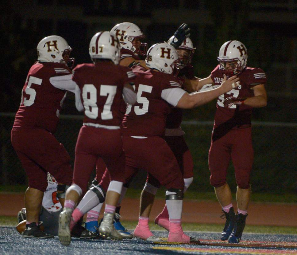 Leah Hogsten  |  The Salt Lake Tribune
Herriman celebrates Colby Stephenson's touchdown in the second half.  Herriman High School defeated American Fork High School 30-10 during their Region 4 football game, October 7, 2016 in Herriman.