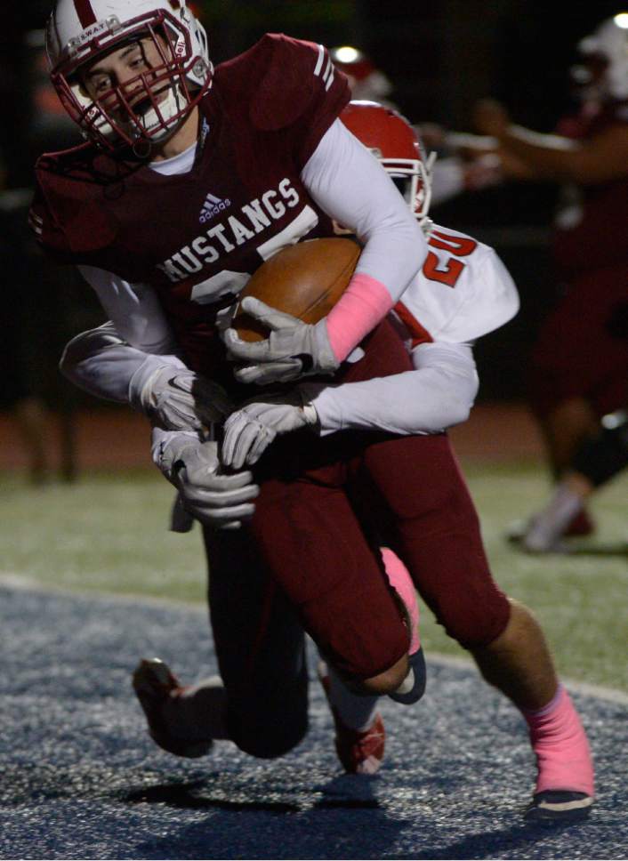 Leah Hogsten  |  The Salt Lake Tribune
Herriman's Anthony Perschon with the touchdown. Herriman High School leads American Fork High School 16-0 at the half during their Region 4 football game,  October 7, 2016 in Herriman.