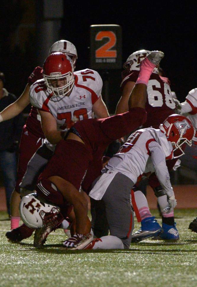 Leah Hogsten  |  The Salt Lake Tribune
 Herriman's Noah Vaea goes vertical on a play. Herriman High School leads American Fork High School 16-0 at the half during their Region 4 football game,  October 7, 2016 in Herriman.