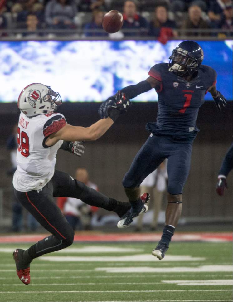 Rick Egan  |  The Salt Lake Tribune

Utah Utes tight end Harrison Handley (88) tries to grab a pass, that was tipped by Arizona Wildcats safety Tellas Jones (1 )in the first half, in PAC-12 action against  the Arizona Wildcats, in Tucson, Saturday, November 14, 2015.