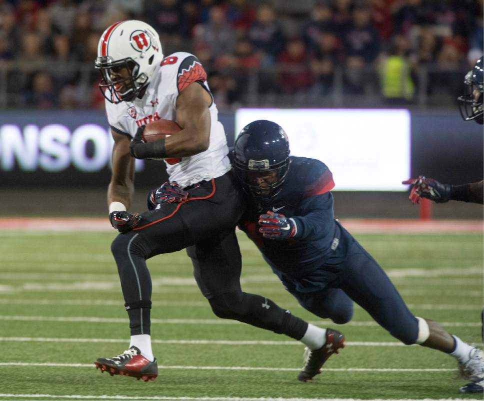 Rick Egan  |  The Salt Lake Tribune

Utah Utes wide receiver Bubba Poole (8) runs the ball, in the first half, in PAC-12 action against  the Arizona Wildcats, in Tucson, Saturday, November 14, 2015.
