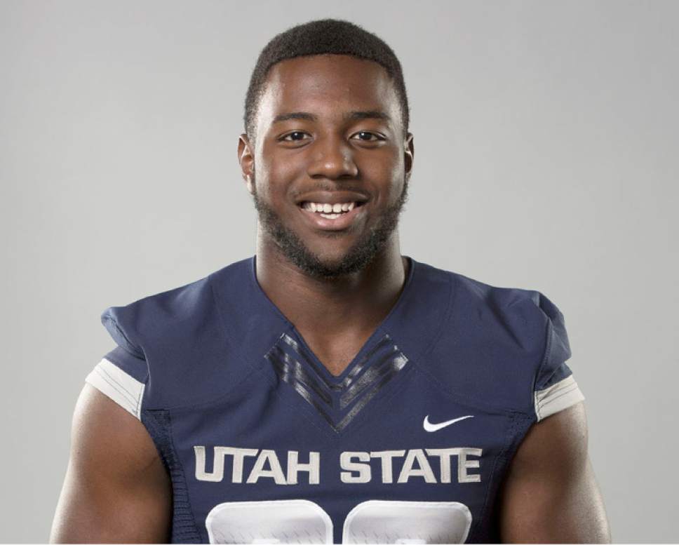 Former USU linebacker Torrey Green arrested, charged with 4 counts of
