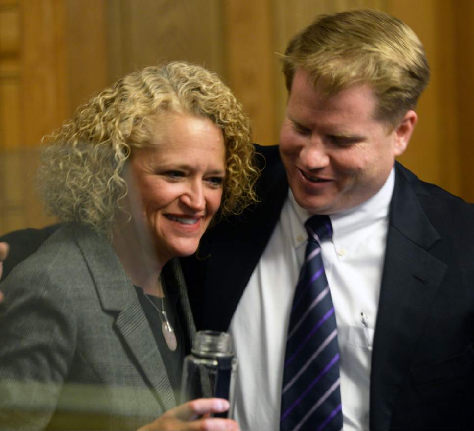 Steve Griffin / Tribune file photo

Salt Lake City Mayor Jackie Biskupski gets a hug from City Council Chairman James Rogers after she detailed her budget for the fiscal year on Tuesday, May 3, 2016. But things have gotten more tense lately as the new mayor and council tangle over proposed new homeless shelters in the city.