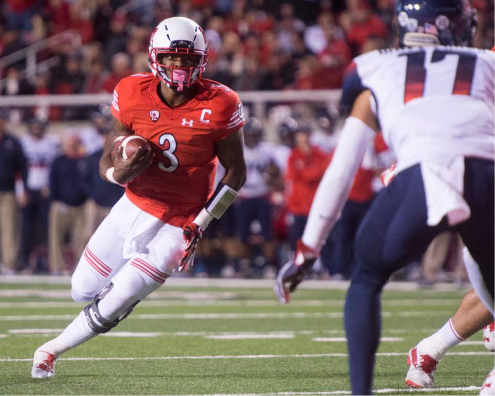 Rick Egan  |  The Salt Lake Tribune

Utah quarterback Troy Williams (3) runs for a second half touchdown for the Utes, in PAC-12 football action, Utah vs. The Arizona Wildcats, at Rice-Eccles Stadium, Saturday, October 8, 2016.