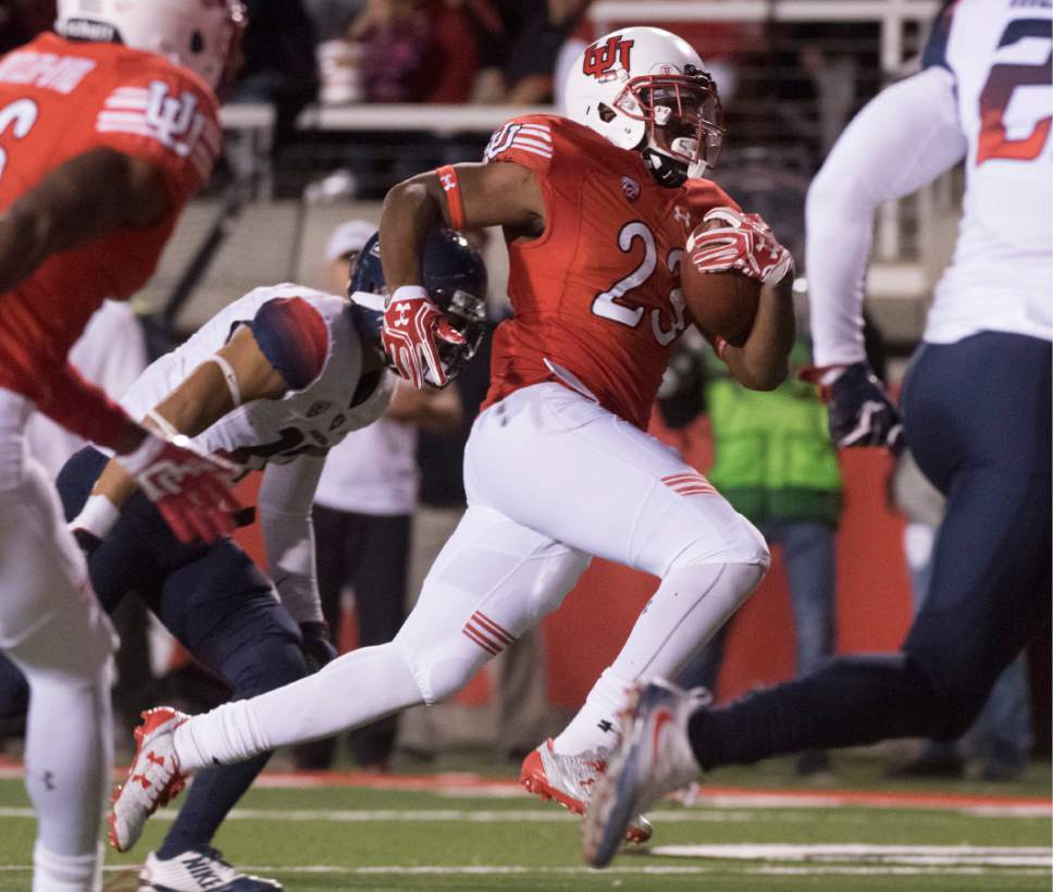 Rick Egan  |  The Salt Lake Tribune

Utah Utes running back Armand Shyne (23) runs for a third quarter touchdown  in PAC-12 football action, Utah vs. The Arizona Wildcats, at Rice-Eccles Stadium, Saturday, October 8, 2016.