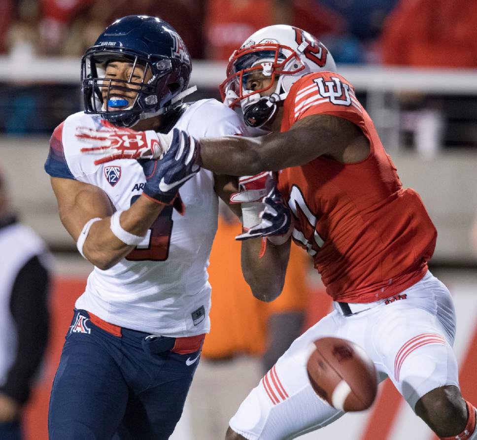 Rick Egan  |  The Salt Lake Tribune

Arizona Wildcats cornerback Dane Cruikshank (9) breaks up a pass intended for Utah Utes wide receiver Demari Simpkins (17). Defensive pass interference was called on the play, in PAC-12 football action, Utah vs. The Arizona Wildcats, at Rice-Eccles Stadium, Saturday, October 8, 2016.