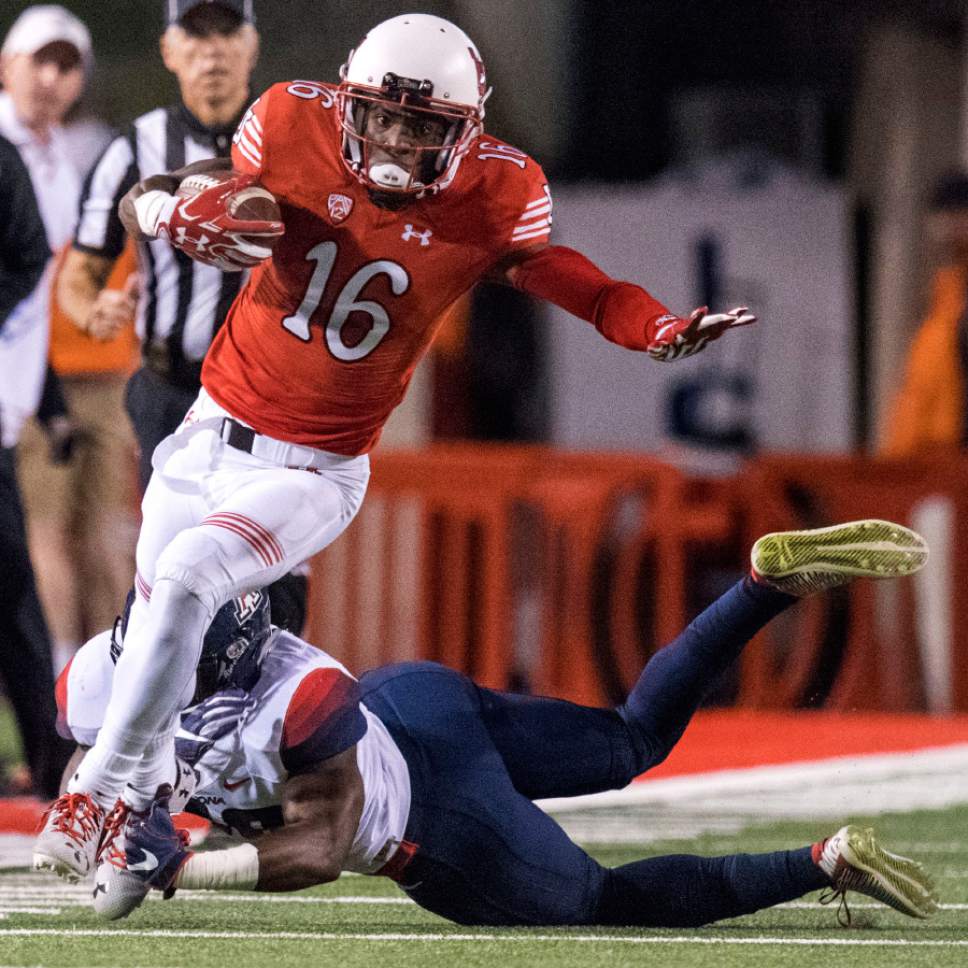 Rick Egan  |  The Salt Lake Tribune

Utah wide receiver Cory Butler-Byrd (16) gets past the Arizona defender, as he runs for the Utes, in PAC-12 football action, Utah vs. The Arizona Wildcats, at Rice-Eccles Stadium, Saturday, October 8, 2016.