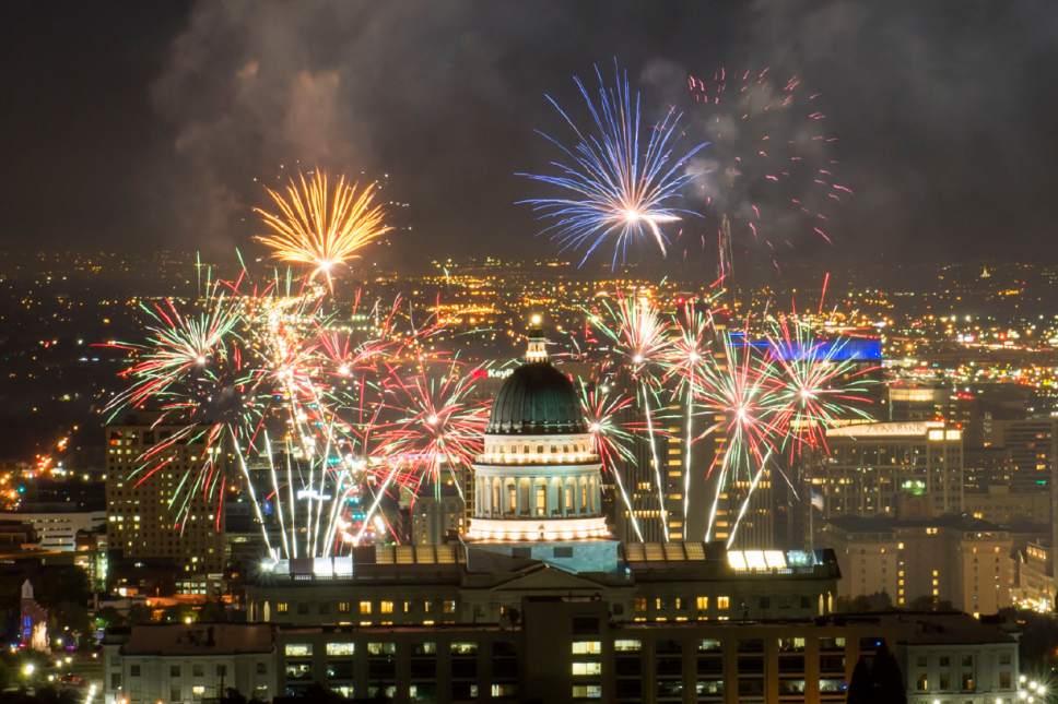 Jeremy Harmon  |  The Salt Lake Tribune
Fireworks explode above the State Capitol during centennial celebrations for the building on Saturday.