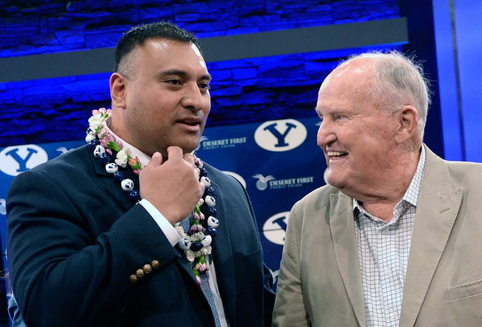 Al Hartmann  |  The Salt Lake Tribune
BYU's new head coach Kalani Sitaki talks with his old head coach Lavell Edwards after a press conference in Provo Monday Dec. 21.
