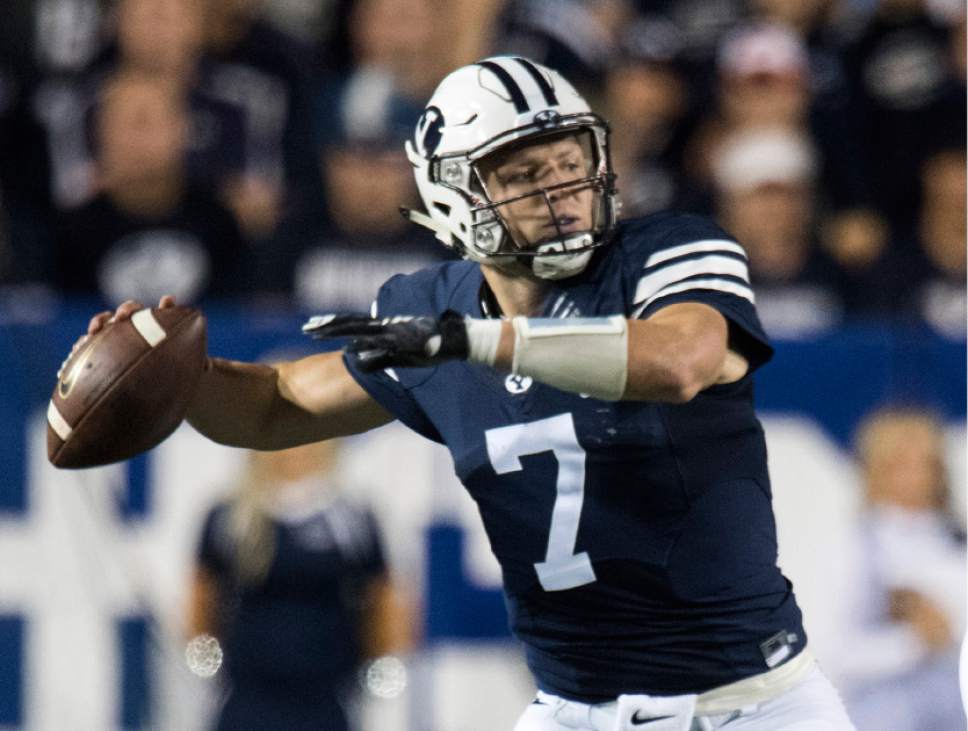 Rick Egan  |  The Salt Lake Tribune
Brigham Young quarterback Taysom Hill  prepares to pass for the Cougars,  in football action, BYU vs, UCLA, at Lavell Edwards Stadium earlier this month.