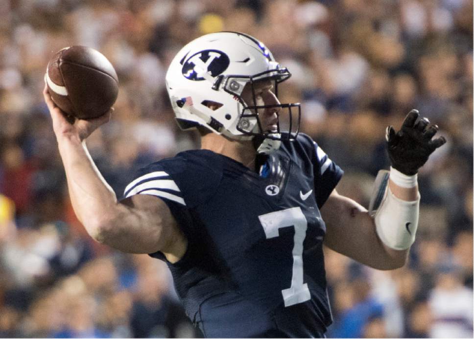 Rick Egan  |  The Salt Lake Tribune

 Brigham Young quarterback Taysom Hill (7) throws a pass for the Cougars, in football action, BYU vs, UCLA, at Lavell Edwards Stadium, Saturday, September 17, 2016.