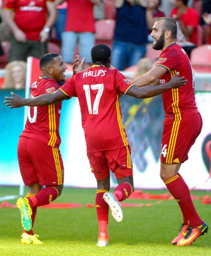 Leah Hogsten  |  The Salt Lake Tribune
Real Salt Lake forward Yura Movsisyan (14) scores in the first half and celebrates with the team. Real Salt Lake is tied 1-1with the Colorado Rapids during their Rocky Mountain Championship Cup game at Rio Tinto Stadium Friday, August 26, 2016.