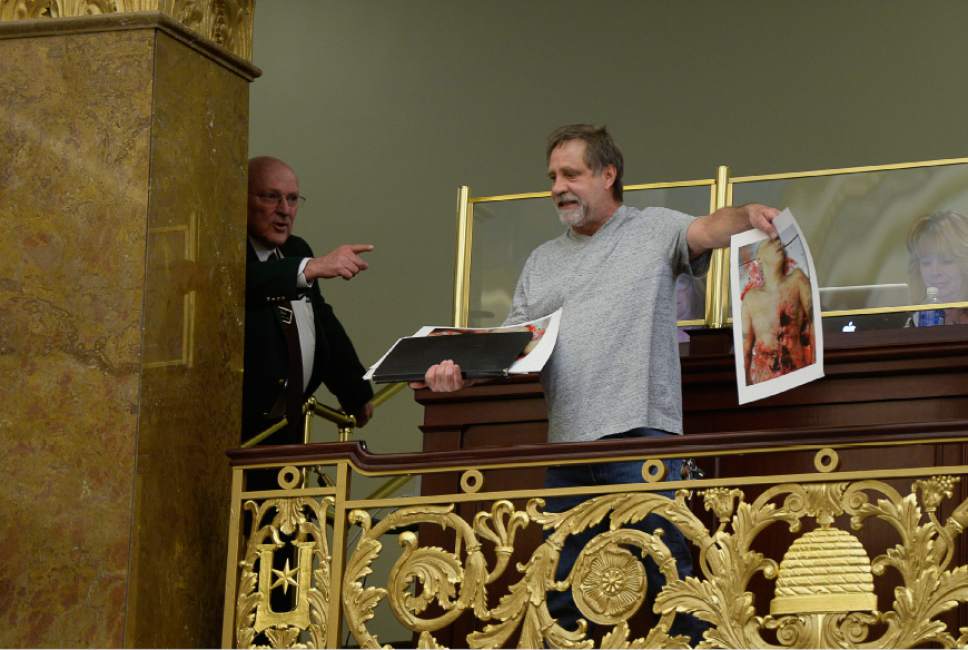 Francisco Kjolseth | The Salt Lake Tribune
Randy Gardner, brother of Ronnie Lee Gardner who was executed by firing squad in Utah in 2010, disrupts the House chamber to protest the firing squad on Thursday, March 10, 2016. SB189 would abolish the death penalty in Utah.