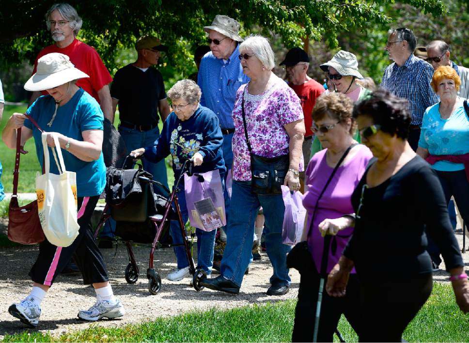 Scott Sommerdorf   |  The Salt Lake Tribune
Seniors embark upon a one-mile walk as Salt Lake County Aging & Adult Services and Humana encouraged Utah seniors to participate in a range of health and wellness activities at Wheeler Historic Farm, Wednesday, May 27, 2015.