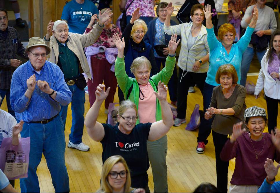 Scott Sommerdorf   |  The Salt Lake Tribune
Seniors dance to First Lady Michelle Obama's "Let's Move! #GimmeFive Dance" Challenge as Salt Lake County Aging & Adult Services and Humana encouraged Utah seniors to participate in a range of health and wellness activities at Wheeler Historic Farm, Wednesday, May 27, 2015.