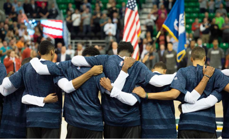 Steve Griffin / The Salt Lake Tribune


Utah Jazz players embrace during the National Anthem at the start of their game against the Phoenix Suns at Vivint Smart Home Arena in Salt Lake City Wednesday October 12, 2016.