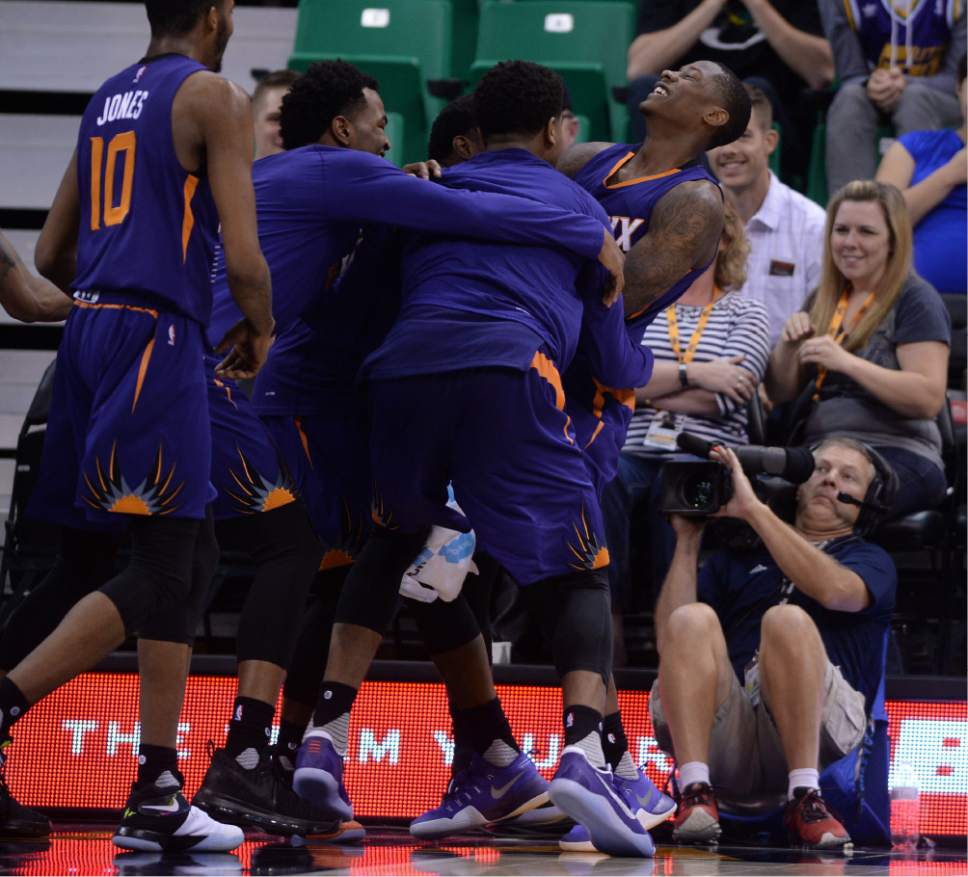 Steve Griffin / The Salt Lake Tribune


Phoenix Suns guard Archie Goodwin (20), right, is mobbed by his teammates after he got to the basket and dunked with 3 seconds left giving the Suns a 111-110 victory over the Jazz at Vivint Smart Home Arena in Salt Lake City Wednesday October 12, 2016.