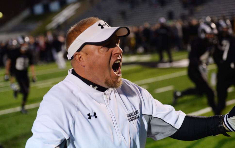 Steve Griffin  |  The Salt Lake Tribune

Highland head coach Brody Benson screams with excitement after Ram's kicker Kasra Rahmati drilled a game winning kick in double overtime giving the Rams an unbelievable double overtime victory over Corner Canyon at Highland High School in Salt Lake City, Friday, November 6, 2015.  Highland scored 21 points in the final 3 minutes of the game to tie Corner Canyon at 35 and went on to win in double overtime 41-38.