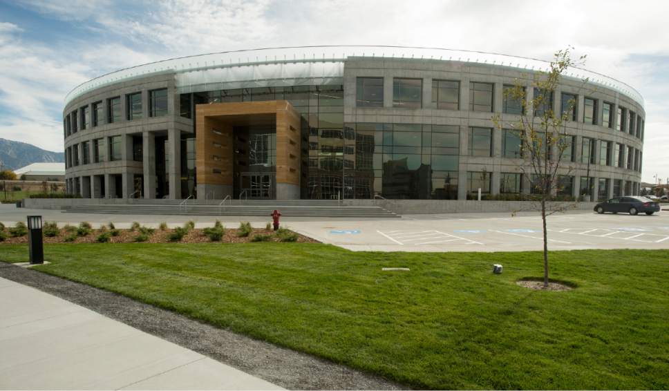Rick Egan  |  The Salt Lake Tribune

The Overstock.com, Peace Coliseum corporate campus opened Friday. The 231,000-square-foot main office building is located on 19 acres of land at 799 West Coliseum Way in Midvale, was designed to appear from the air as a peace sign (due to the indoor and outdoor pathways intersecting its circular layout), and to appear from ground level as a corporate glass-and-concrete version of the Roman Coliseum. 
Thursday, October 13, 2016.