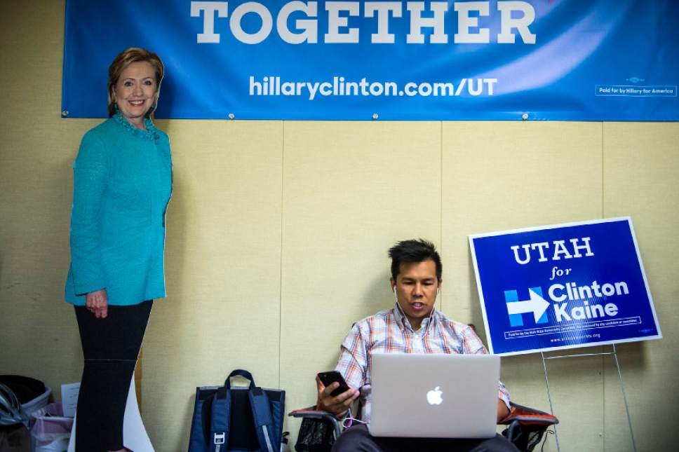 Chris Detrick  |  The Salt Lake Tribune
Volunteer Daniel Magpali makes phone calls at the Hillary for America Utah headquarters Thursday October 13, 2016.