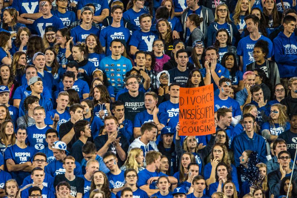 Chris Detrick  |  The Salt Lake Tribune
A Brigham Young Cougar fan holds up a sign during the game at LaVell Edwards Stadium Friday October 14, 2016. Brigham Young Cougars defeated Mississippi State Bulldogs 28-21in double overtime.