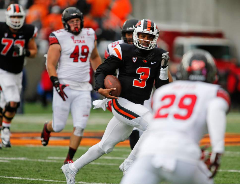 Oregon State quarterback Marcus McMaryion (3) makes his way through the Utah defense in the second half of an NCAA college football game in Corvallis, Ore., on Saturday, Oct. 15, 2016. Utah won 19-14. (AP Photo/Timothy J. Gonzalez)