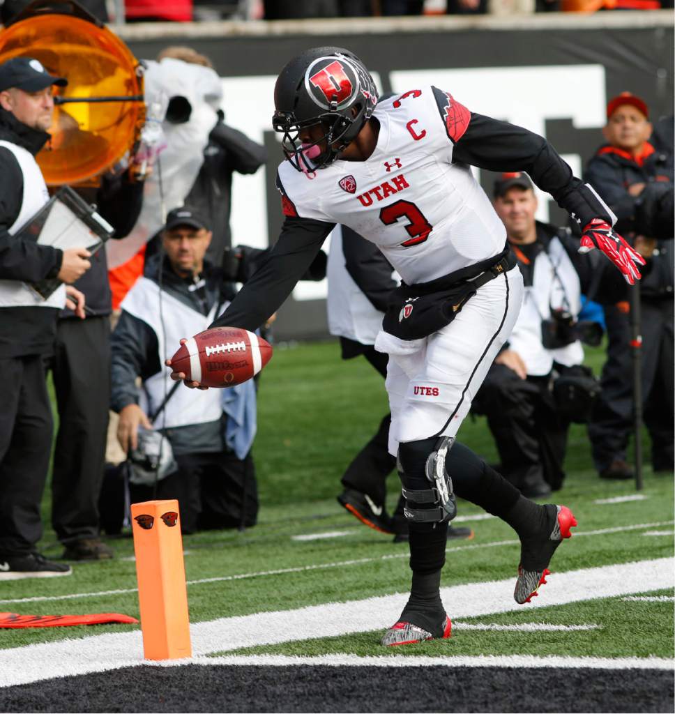 Utah quarterback Troy Williams (3) reaches the ball to the end zone for a touchdown during the second half of an NCAA college football game against Oregon State, in Corvallis, Ore., on Saturday, Oct. 15, 2016. Utah won 19-14. (AP Photo/Timothy J. Gonzalez)