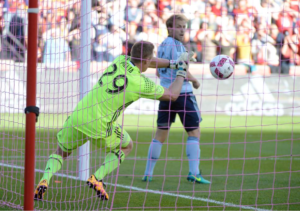Francisco Kjolseth | The Salt Lake Tribune
Sporting Kansas City goalkeeper Tim Melia (29) punches one out of the goal as Real Salt Lake hosts Sporting KC in MLS soccer at Rio Tinto Stadium in Sandy, Sunday, Oct. 16, 2016.